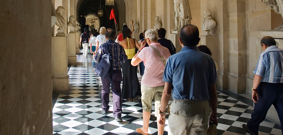People standing in line at a museum
