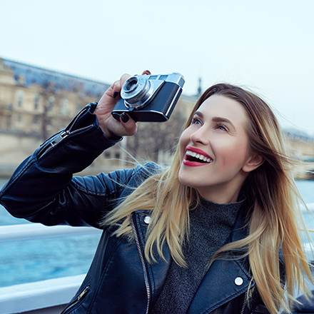 Woman smiling taking a photo