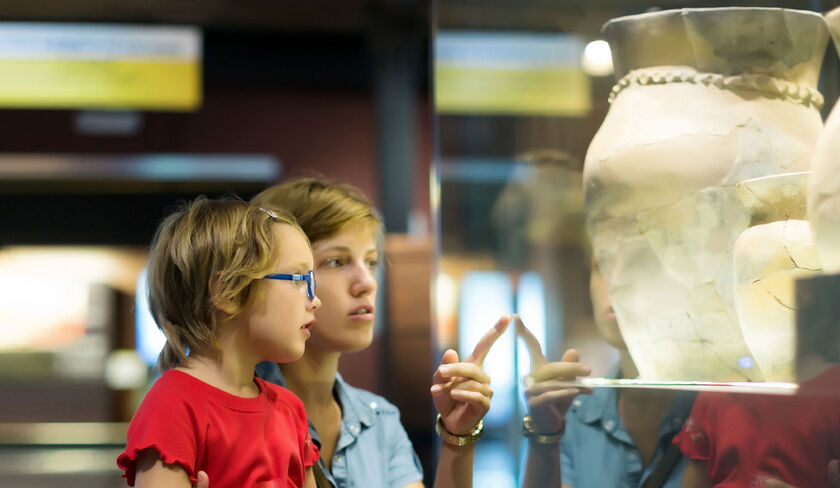 Two people looking at an exhibit