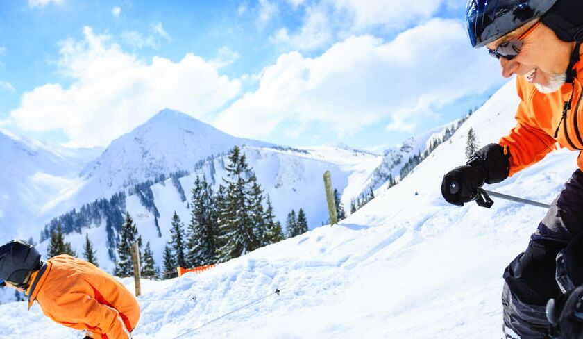 Two people snowboarding